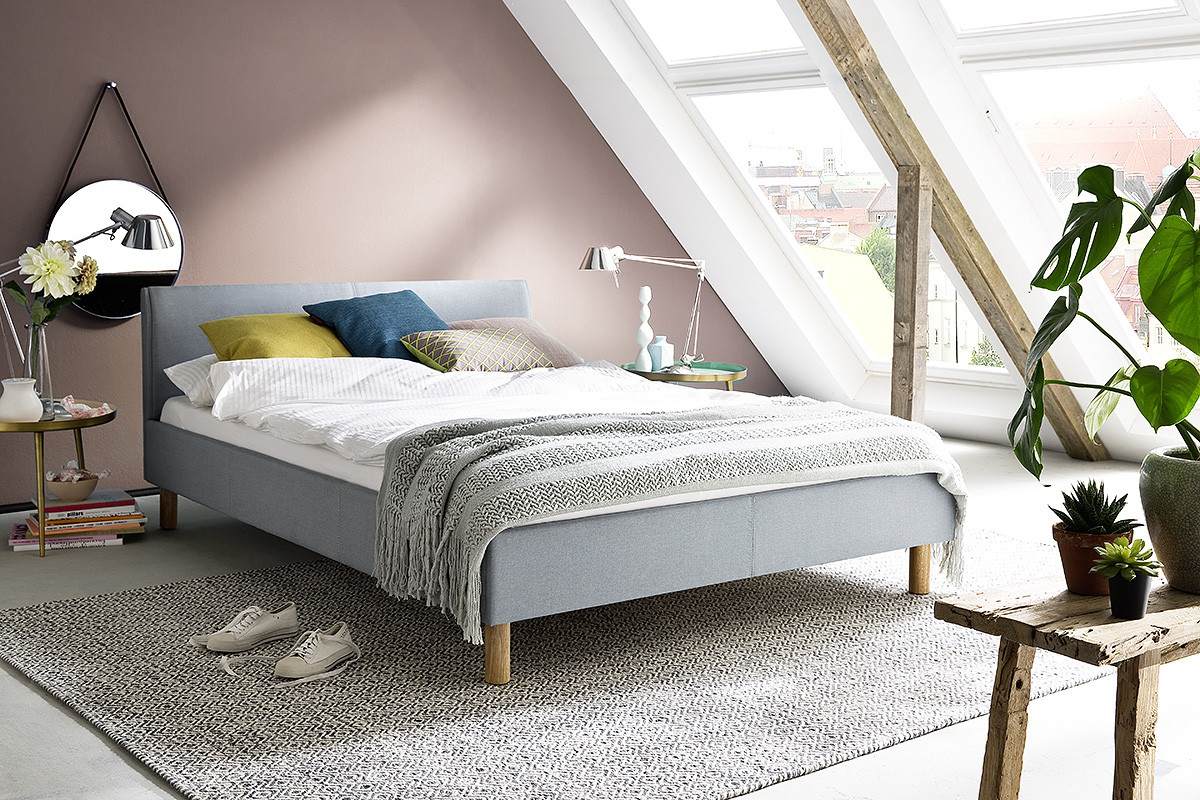 upholstered bed lena 140 x 200 cm light blue with wooden legs decovry com